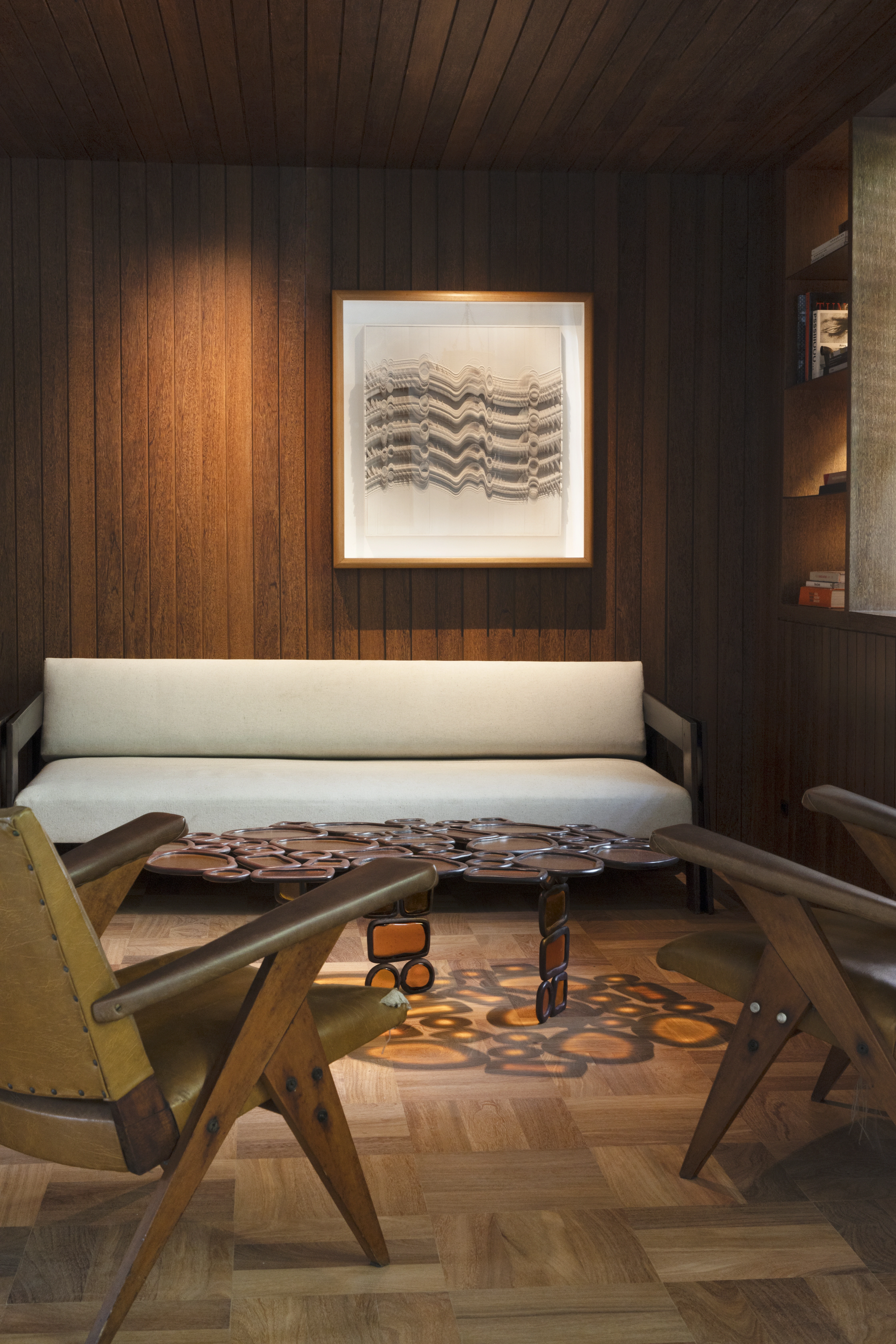 Elegant interior with wooden furniture and artwork