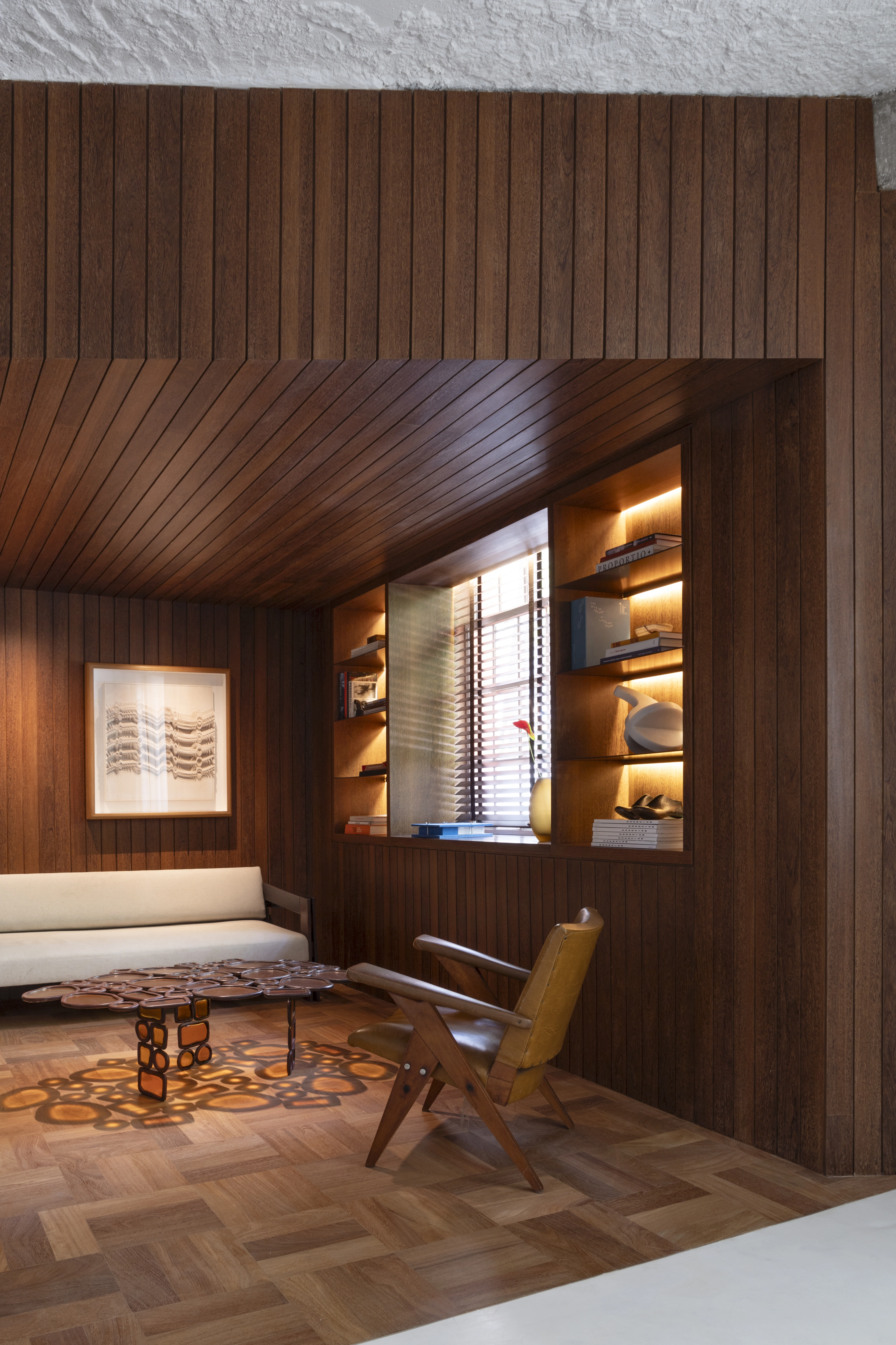 Elegant interior with wooden furniture and artwork